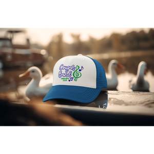 ai-created-mockup-of-a-trucker-hat-placed-by-a-lake-with-swans-m33557_1