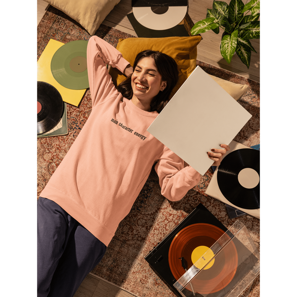 comfort-colors-sweatshirt-mockup-of-a-smiling-woman-lying-on-the-floor-with-a-vinyl-m56620_1