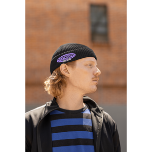 fisherman-beanie-mockup-featuring-a-serious-man-in-a-hip-hop-style-posing-on-the-street-m39231