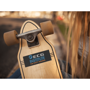 long-haired-girl-holding-a-longboard-with-a-sticker-glued-to-it-while-outdoors-mockup-a14309_1