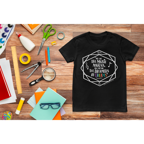 mockup-of-a-bella-canvas-round-neck-tee-placed-on-a-wooden-surface-with-school-stuff-m56723_2