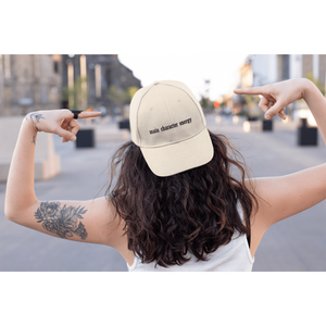 mockup-of-a-tattooed-woman-in-the-street-pointing-at-her-dad-hat-27038_1