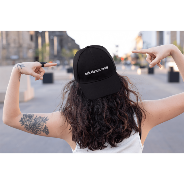 mockup-of-a-tattooed-woman-in-the-street-pointing-at-her-dad-hat-27038_89b9e10a-2e97-4146-8561-fb94c52597fc
