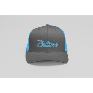 mockup-of-a-trucker-hat-placed-on-a-colorful-surface-m33408_1