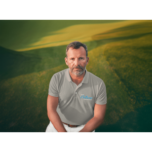 sport-polo-shirt-mockup-of-an-ai-generated-man-posing-in-a-golf-field-m50903