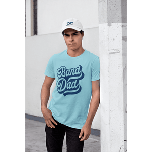 tee-mockup-featuring-a-man-with-a-dad-hat-leaning-against-a-light-pole-31172