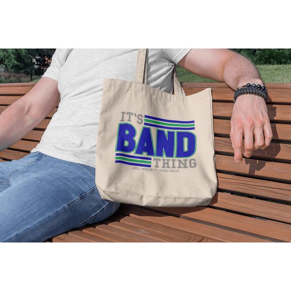 tote-bag-mockup-featuring-a-man-sitting-on-a-wooden-bench-195-el