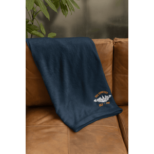 velveteen-plush-fleece-blanket-mockup-featuring-a-nice-couch-m35705