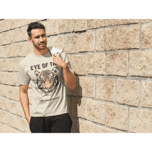 young-man-standing-next-to-a-brick-wall-t-shirt-mockup-a8018_1